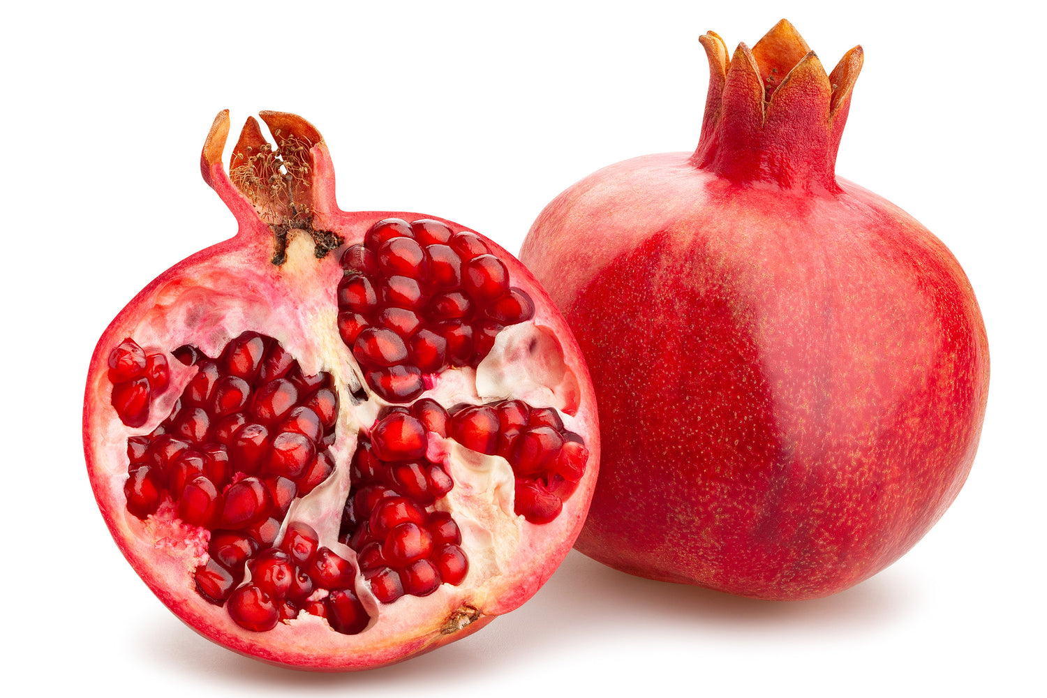 ein ganzer und ein aufgeschnittener Granatapfel | a hole and a cut pomegranate 